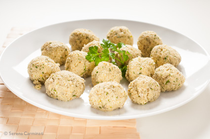 Oven-cooked broad bean falafel (raw on a plate, front view)