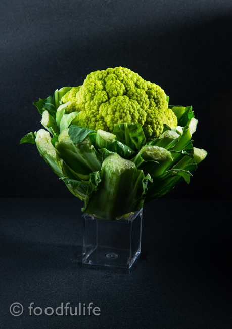 Green cauliflower on little box